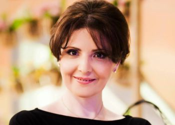 Georgian MP: People Dig Through Trash in Paris Too