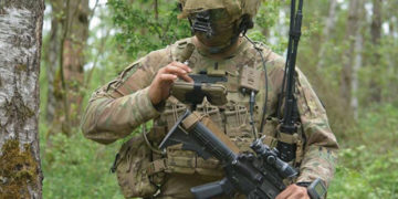 A US Army soldier uses the Nett Warrior end-user device to report information to his company commander in the field. Source: US Army photo/Spc. Joshua Cofield