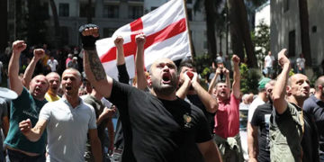 Protesters in Tbilisi march in the center of the city against European Union integration as well as the involvement of concurrent Tbilisi Pride demonstrators Photo by Irakli Gedenidze/Reuters