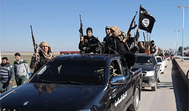 Islamic Fighters stage a motorized rally in Syria during the height of their command of the region in 2015. The majority of the fighters would go on to be eliminated in a joint NATO-Iraq offensive in the coming years. Source: Militant website via AP