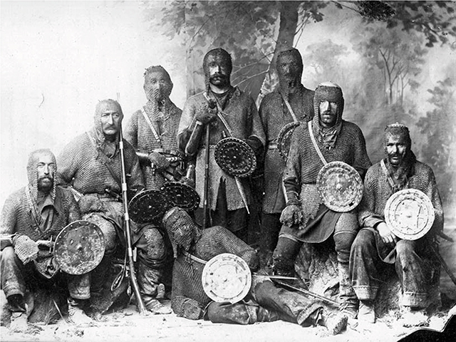 Khevsurs, in Georgian ხევსურეთი, with their traditional arms and armor gather for a photo displaying their martial prowess as mountain soldiers. Source: Photographer unknown