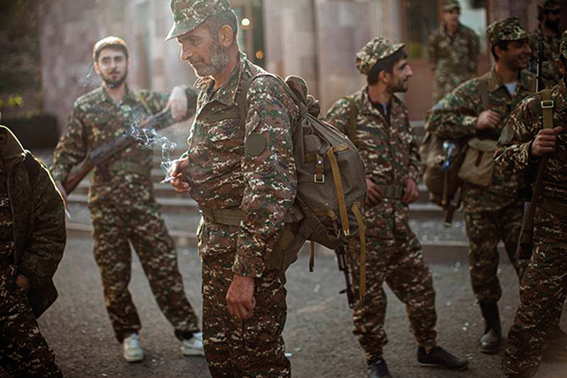 Ethnic Armenian volunteer recruits gather at a centre near Hadrut, self-proclaimed Republic of Nagorno-Karabakh. AP