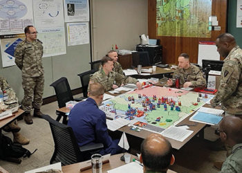 A resident seminar in the 2020 Class in the U.S. Army War College works its way through a round of the strategy game Joint Overmatch: Euro-Atlantic applying lessons learned throughout the year. Photo by Ken Gilliam/U.S. Army War College