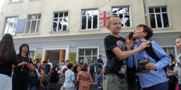 Students and parents exit their school at the end of a school day at a public school in Tbilisi. Photo by Monica Ellena/Eurasianet
