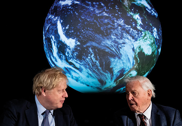 British Prime Minister Boris Johnson and David Attenborough speak during a conference about COP26. Source: Reuters