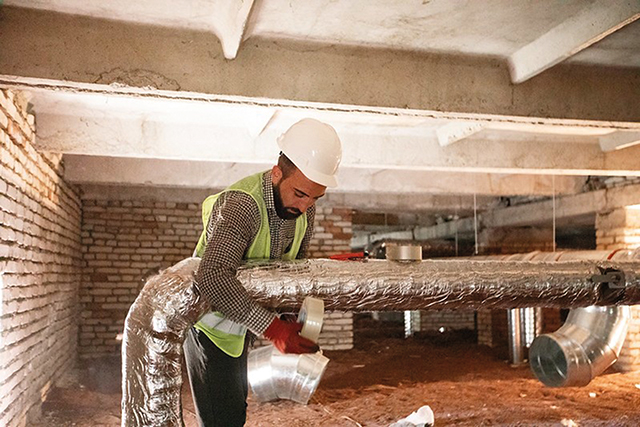 Beka Kurtanidze, worker, installing thermal insulation, Public School No. 7 in Akhaltsikhe. With thermo modernization, schools and kindergartens can be fully heated without need for firewood or natural gas. Costs will be saved on energy; air quality will be improved and gas emissions reduced