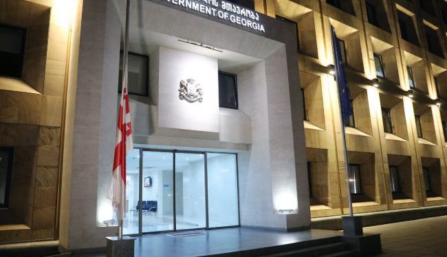 Sovereign Flag of Georgia Hoisted on Building of Government Administration on Day of Soviet Occupation