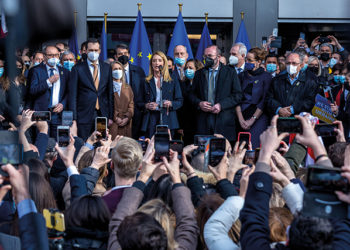 European Parliament President Roberta Metsola, center, speaks during a demonstration in front of the European Parliament in Brussels on March 1. Photo by Omar Havana/Getty Images