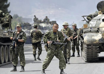 2008, Russian soldiers block the road on the outskirts of Gori, northwest of the capital Tbilisi, Georgia. Photo by Darko Bandic?AP
