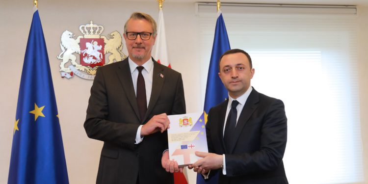 PM Hands First Part of EU Questionnaire to Carl Hartzell