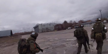 Russian airborne troops advance past a hangar containing the Antonov An-225 Mriya at Antonov (Hostomel) Airport. Source: Russian Ministry of Defense