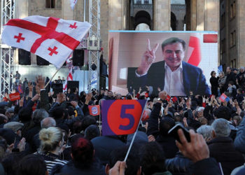 Former Georgian President Mikheil Saakashvili speaks to supporters via video link during a December 2018 rally in Tbilisi. Source: EPA-EFE/Zurab Kurtsikidze