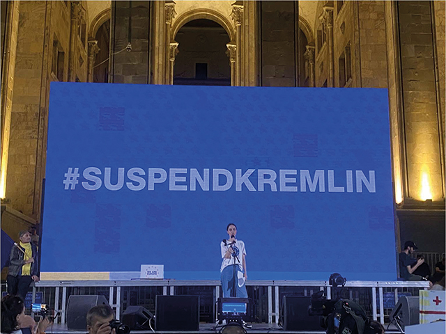 A #SuspendKremlin hashtag at a pro-European Union rally in front of Parliament. Photo by Zviad Adzinbaia