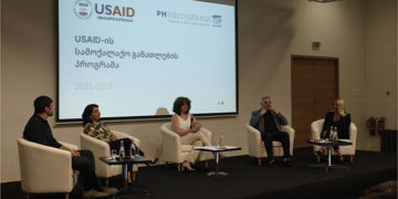 A panel discusses the potential for the new USAID and PH International partnership Civic Education Program. Photo by Mike Godwin
