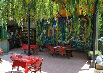 Marleta's Farm is a sophisticated, artsy venue full of gigantic murals, an open cafe, a pool, and a library with a breathtaking view of the snow-topped Caucasus Mountains