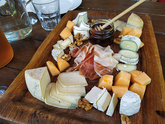 You can order a cheese platter, which includes all their different types of cheeses accompanied by fresh fruit, honey, prosciutto, and nuts