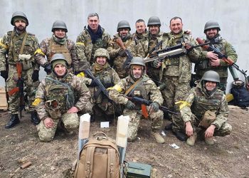 Volunteers in Ukraine’s International Legion of Territorial Defense pose for a photo. Image source: File Photo/The Washington Post