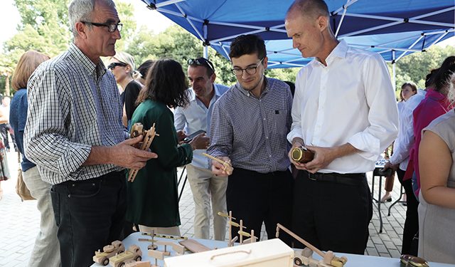 Nick Beresford (right), UNDP Resident Representative in Georgia, attending the handicrafts exhibition showcasing handmade products created by local children and artisans. Photo by Nino Zedginidze/UNDP