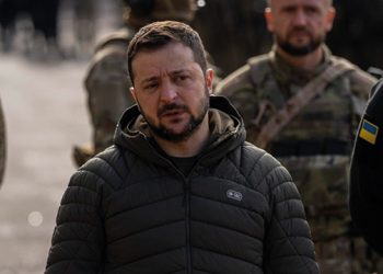 Zelensky photo credits: AP Photo/Bernat Armangue)