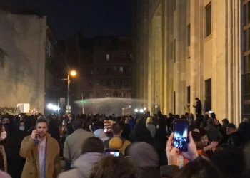 Protesters break down iron barriers at parliament entrance