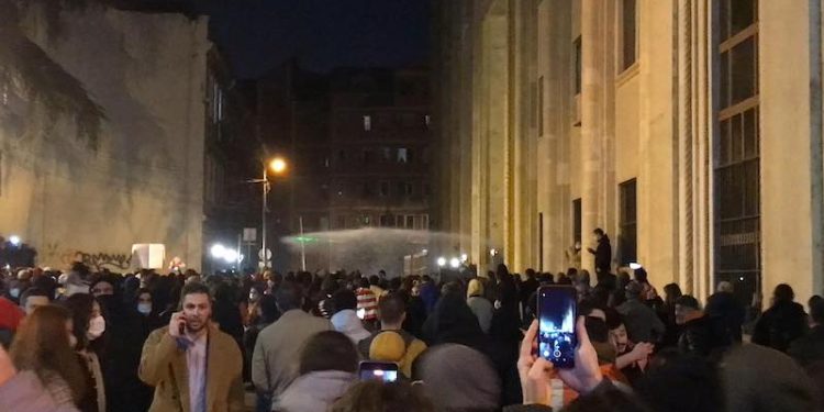 Protesters break down iron barriers at parliament entrance
