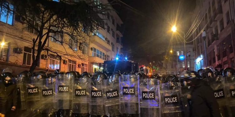 Riot police use water cannon and pepper spray against protesters