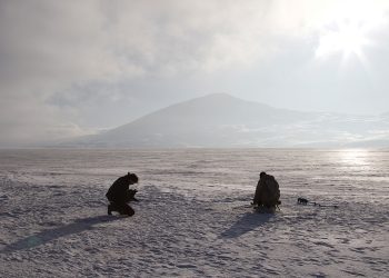 Saxon Bosworth filming a local fisherman on the frozen Lake Tabatskuri in January this year (a scene in Mr. Velvet Scoter).