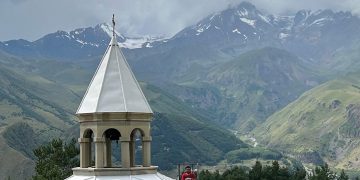 The author near the Icon of Elias of Stepantsminda (Saint George of Khedenish). Photo by Dr. Arkaja Goswami