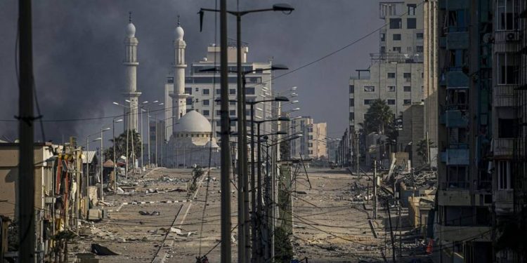 Israel says its troops have completed encirclement of Gaza City