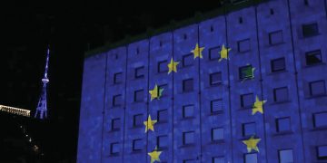 Georgia's Government Administration Building, illuminated in the colors of the EU flag. Source: Facebook, Georgian government