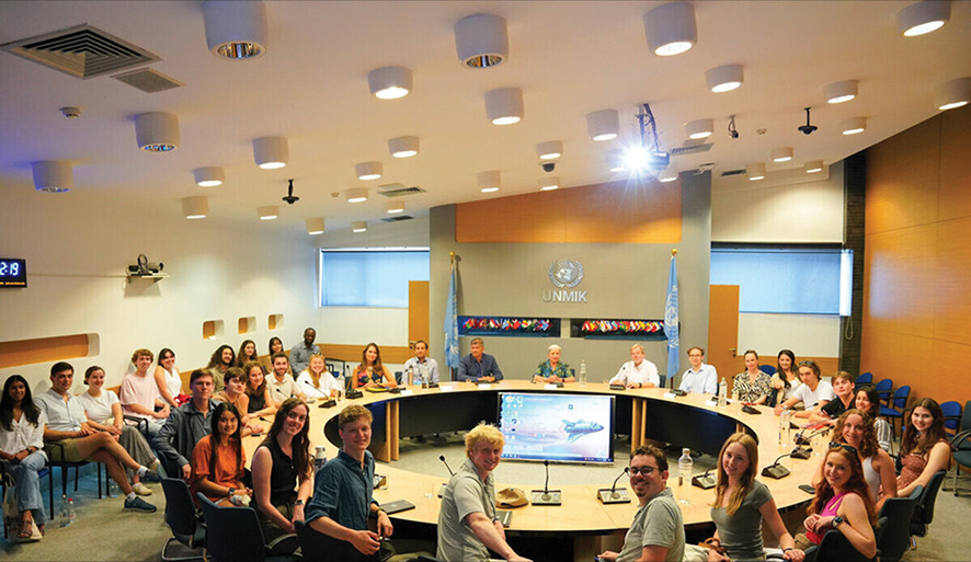 Undergraduate students, whose program has a specific focus on the role of international organizations in post-conflict peace- and institution-building, visit UNMIK (UN Mission in Kosovo) Headquarters in Pristina. Source: peacekeeping.un.org
