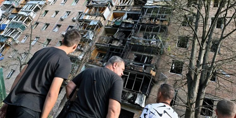 A multistory residential building in Kursk, Russia, was hit, according to local authorities, by debris from a destroyed Ukrainian missile in the course of the Russia-Ukraine conflict. Source: Anatoliy Zhdanov/Kommersant Photo via Reuters