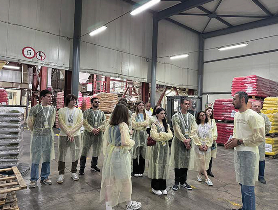 Scholarship students learn about production processes at the Nutrimax plant