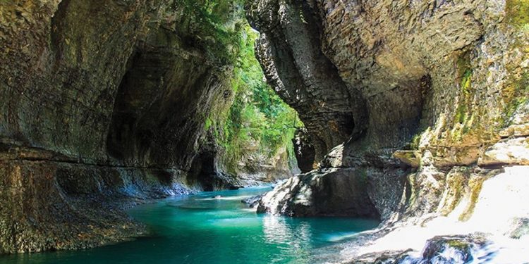 The blue waters and high walls of the Martvili Canyon. Source: beqatours.com