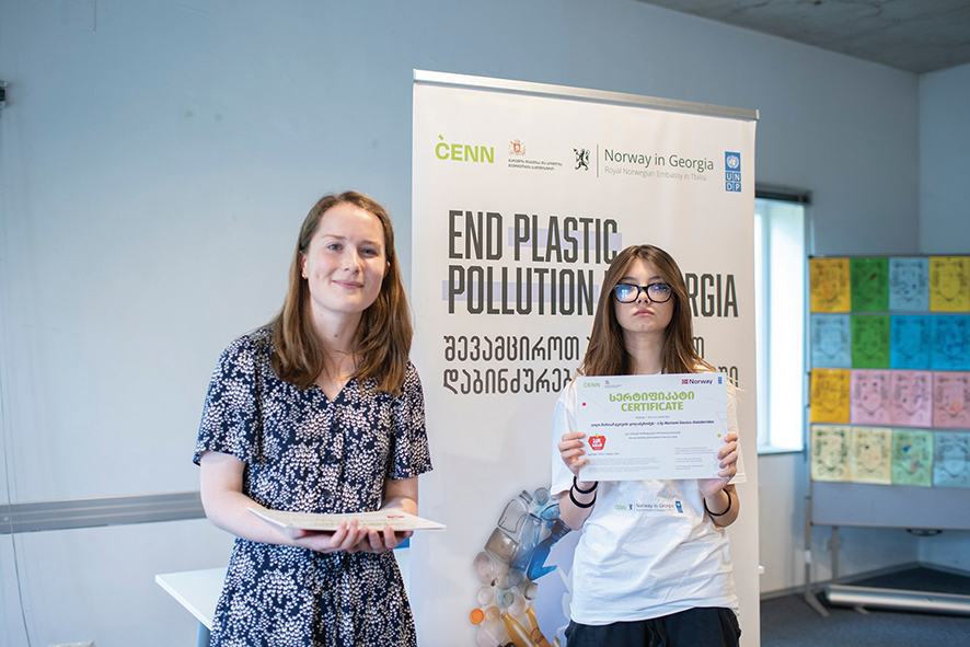 Me receiving my certificate of participation from Rebecca Lie, the Deputy Ambassador of Norway.  Source: UNDP