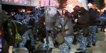 Busloads of riot police arrive at the protest