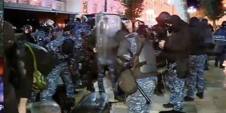 Busloads of riot police arrive at the protest