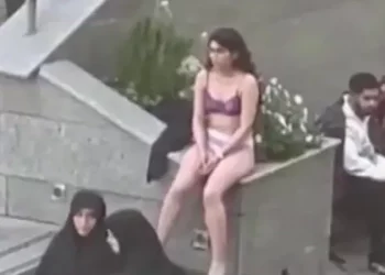 Iranian woman who stripped in anti-hijab protest released without charges