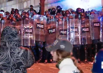 Riot police on the move, warnings issued to clear the streets