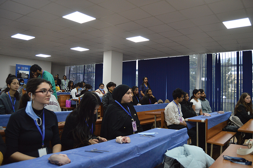 Attendees waiting to make incisions on chicken limbs. Source: IWSS