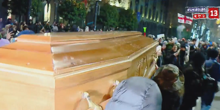Protesters burn “Ivanishvili” in a coffin on Rustaveli Avenue