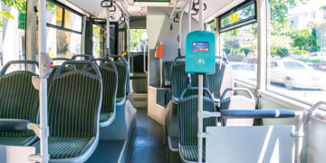 A Tbilisi bus and fare box. Source: redfedoradiary.com