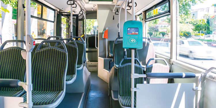 A Tbilisi bus and fare box. Source: redfedoradiary.com