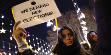 Anti-government demonstrators protest outside parliament Tbilisi on January 1. Source: AFP