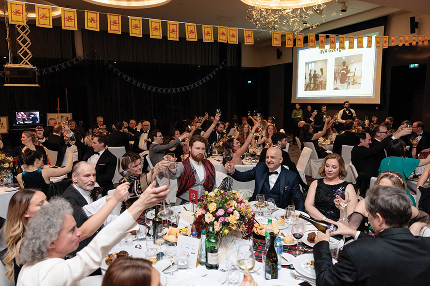 Toasting at the 2025 Burns Supper. Photo by Irakli Chelidze 