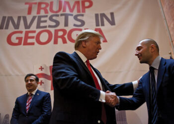 A long time ago...Donald Trump and Giorgi Ramishvili of Georgia's Silk Road Group shake hands as they agree to construct Trump Tower Batumi in April 2012. Photo by Todd Heisler/The New York Times