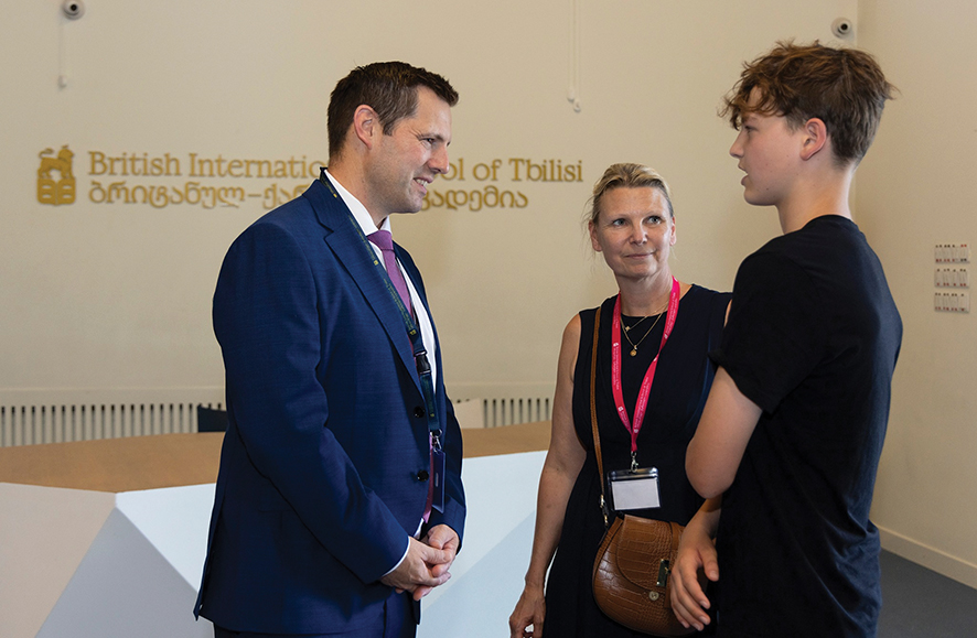 Principal of BIST, Robert Snowden with a pupil. Source: BIST