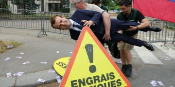 Greenpeace activists steal Macron wax figure in daring Paris protest