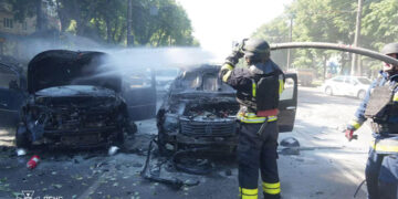 Firefighters extinguish cars hit by a Russian military strike, in Sumy, Ukraine June 3. Source: State Emergency Service of Ukraine/REUTERS