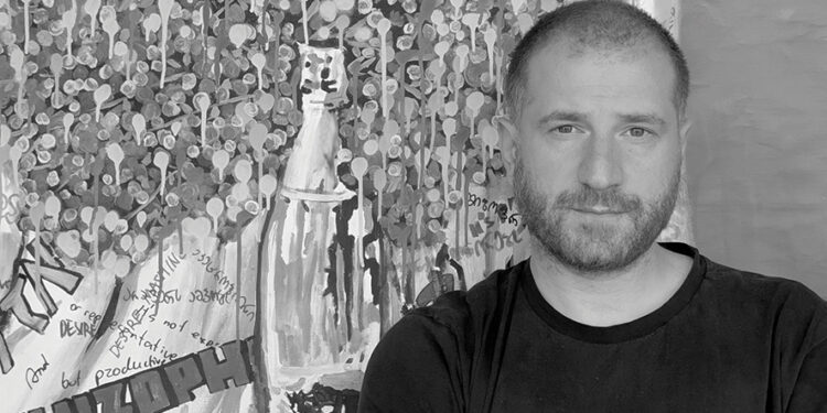 Photo: Gagosh posing in front of his recent piece, Still Life.